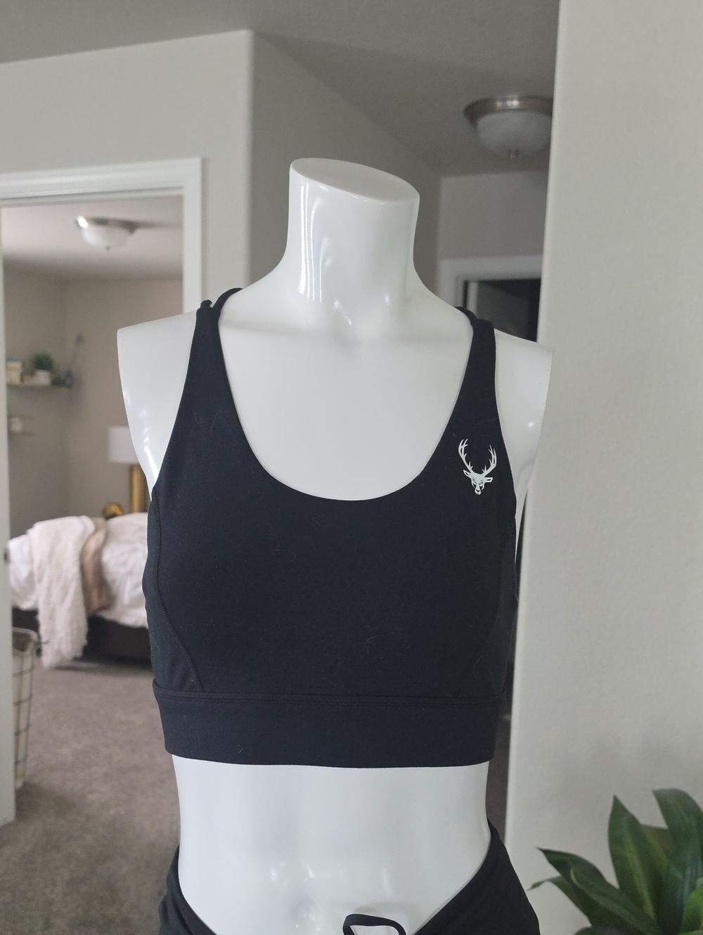 Women's Black Seamless Sports Bra with Minimal Deer Accent